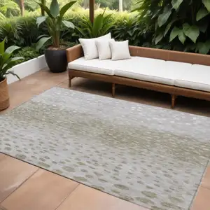 Photo of Taupe Green And Ivory Abstract Washable Indoor Outdoor Area Rug