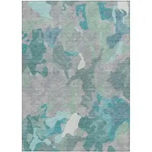 Photo of Taupe Green And Ivory Abstract Washable Indoor Outdoor Area Rug