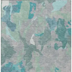 Photo of Taupe Green And Ivory Abstract Washable Indoor Outdoor Area Rug