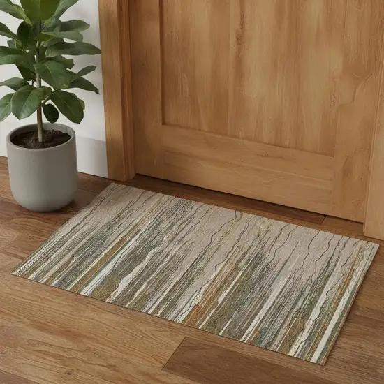 Taupe Green And Rust Striped Washable Area Rug With UV Protection Photo 1