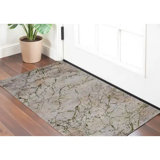 Taupe Green and Tan Abstract Power Loom Area Rug Photo 1