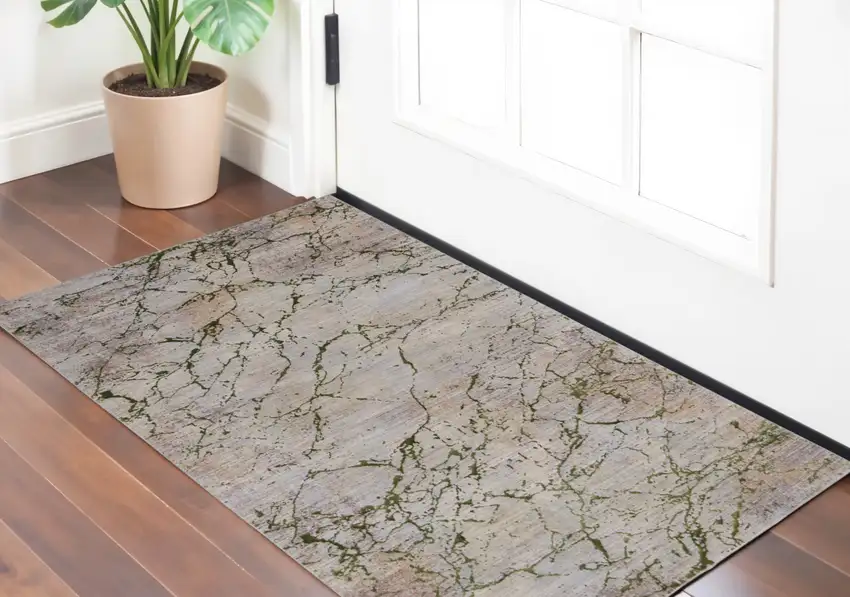 Taupe Green and Tan Abstract Power Loom Area Rug Photo 1