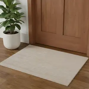 Photo of Taupe Hand Woven Area Rug