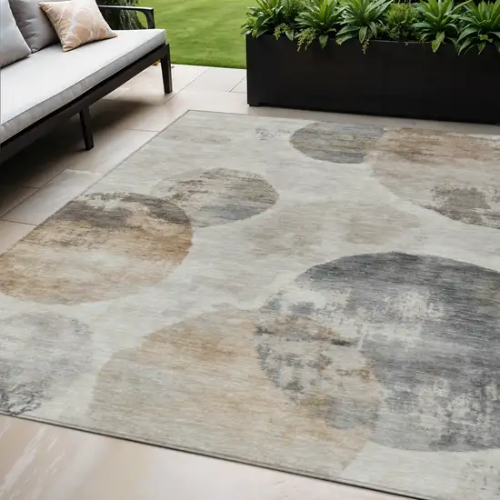 Taupe Ivory And Beige Abstract Washable Indoor Outdoor Area Rug Photo 1