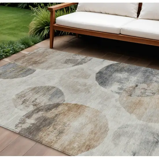 Taupe Ivory And Beige Abstract Washable Indoor Outdoor Area Rug Photo 1