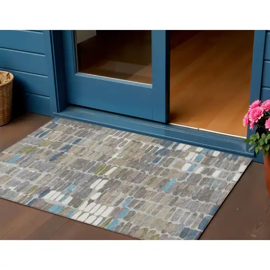 Taupe Ivory And Blue Abstract Washable Indoor Outdoor Area Rug Photo 1