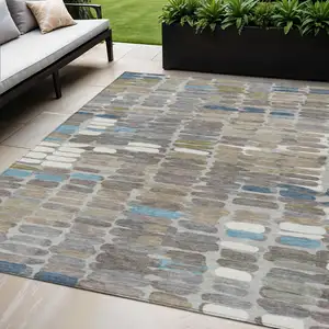 Photo of Taupe Ivory And Blue Abstract Washable Indoor Outdoor Area Rug