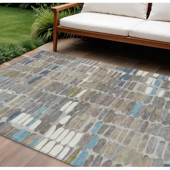 Taupe Ivory And Blue Abstract Washable Indoor Outdoor Area Rug Photo 1