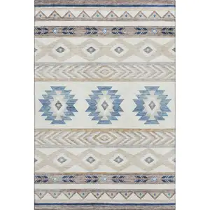 Photo of Taupe Ivory And Blue Geometric Washable Area Rug With UV Protection