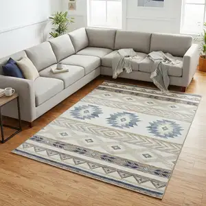 Photo of Taupe Ivory And Blue Geometric Washable Area Rug With UV Protection