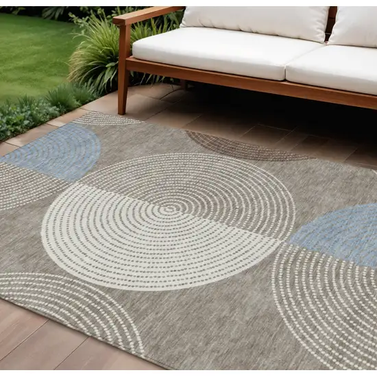 Taupe Ivory And Blue Geometric Washable Indoor Outdoor Area Rug Photo 1