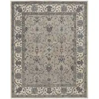 Photo of Taupe Ivory And Blue Wool Floral Tufted Handmade Stain Resistant Area Rug