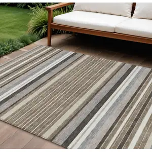 Photo of Taupe Ivory And Brown Striped Washable Indoor Outdoor Area Rug