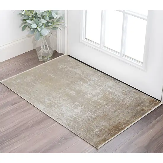Gold and Ivory Abstract Power Loom Distressed Area Rug With Fringe Photo 1