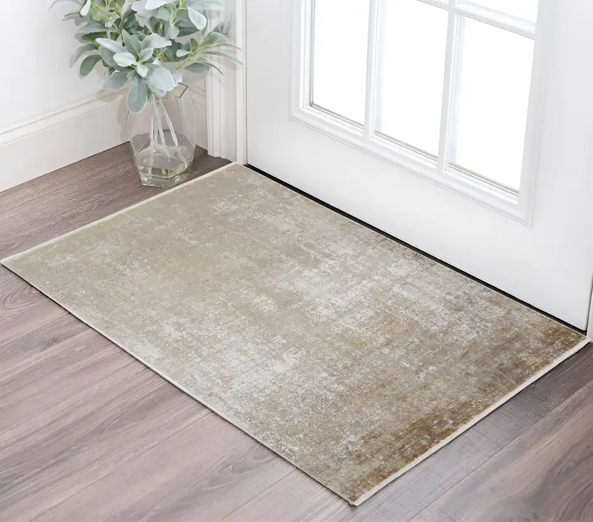 Gold and Ivory Abstract Power Loom Distressed Area Rug With Fringe Photo 1