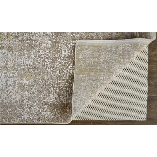 Gold and Ivory Abstract Power Loom Distressed Area Rug With Fringe Photo 4