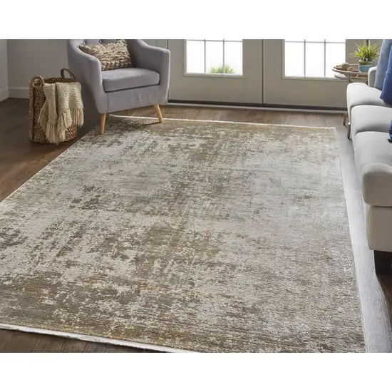Gold and Ivory Abstract Power Loom Distressed Area Rug With Fringe Photo 8