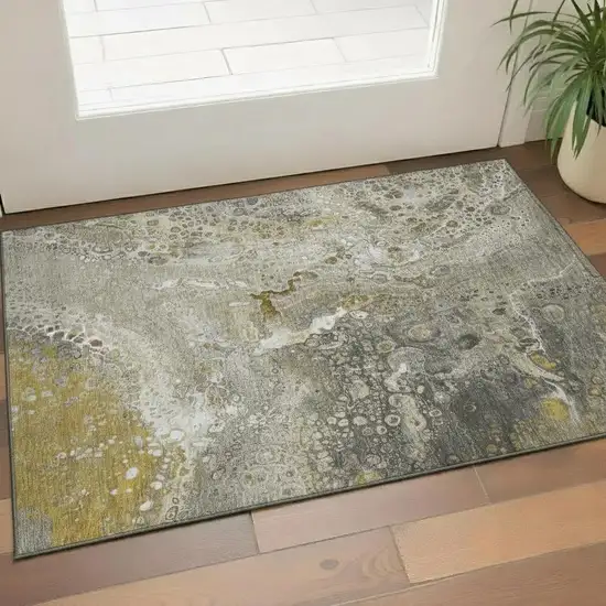 Taupe Ivory And Gold Abstract Washable Area Rug With UV Protection Photo 1