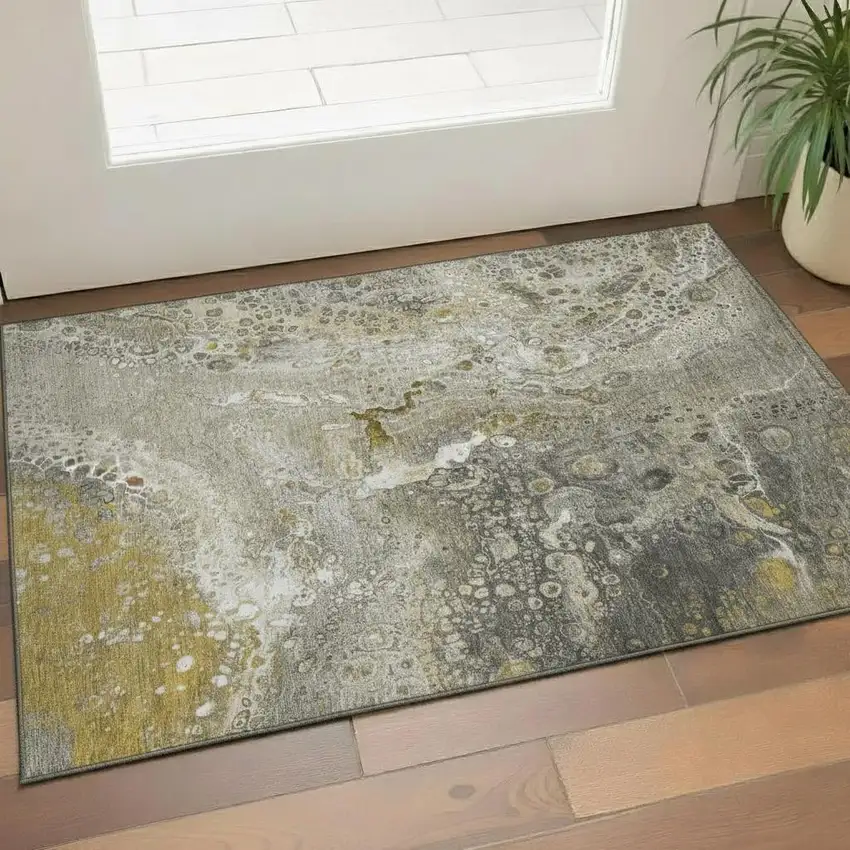 Taupe Ivory And Gold Abstract Washable Area Rug With UV Protection Photo 1