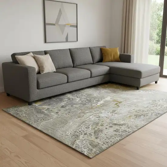 Taupe Ivory And Gold Abstract Washable Area Rug With UV Protection Photo 1