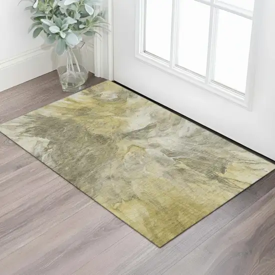 Taupe Ivory And Gold Abstract Washable Area Rug With UV Protection Photo 1