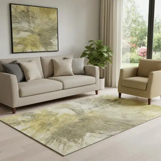 Taupe Ivory And Gold Abstract Washable Area Rug With UV Protection Photo 1