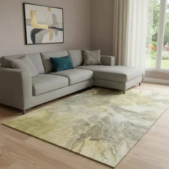 Taupe Ivory And Gold Abstract Washable Area Rug With UV Protection Photo 1