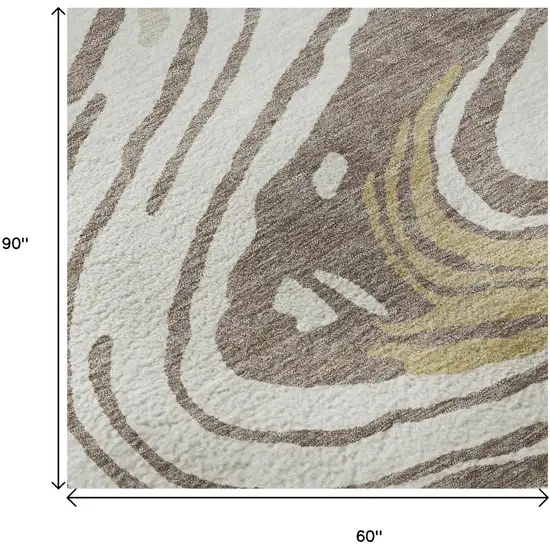 Taupe Ivory And Gold Abstract Washable Area Rug With UV Protection Photo 9