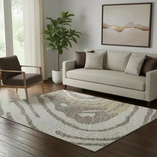Taupe Ivory And Gold Abstract Washable Area Rug With UV Protection Photo 2