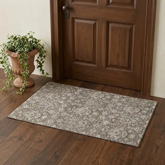 Taupe Ivory And Gold Floral Medallion Distressed Washable Area Rug With UV Protection Photo 1