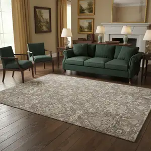 Photo of Taupe Ivory And Gold Floral Medallion Washable Area Rug With UV Protection
