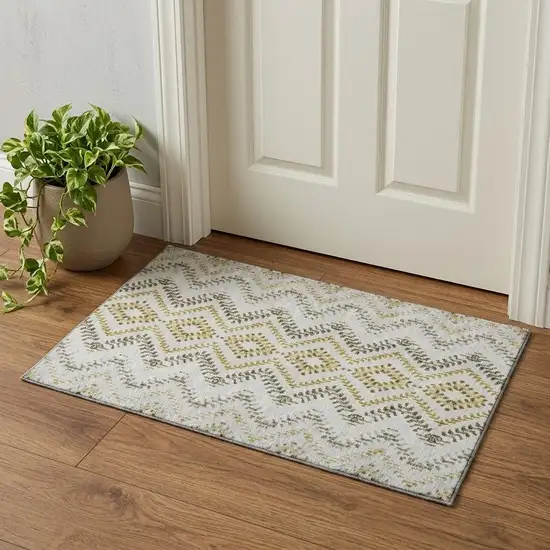 Taupe Ivory And Gold Geometric Washable Area Rug With UV Protection Photo 1
