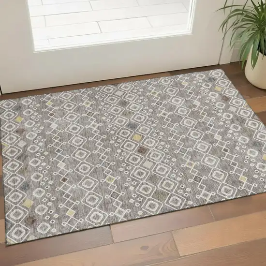 Taupe Ivory And Gold Southwestern Washable Area Rug With UV Protection Photo 1