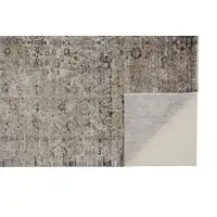 Photo of Taupe Ivory And Gray Abstract Distressed Area Rug With Fringe