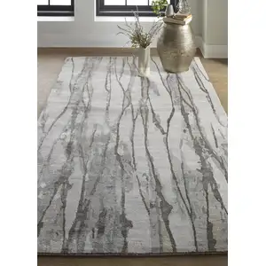 Photo of Taupe Ivory And Gray Abstract Tufted Handmade Area Rug