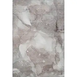 Photo of Taupe Ivory And Gray Abstract Washable Area Rug With UV Protection