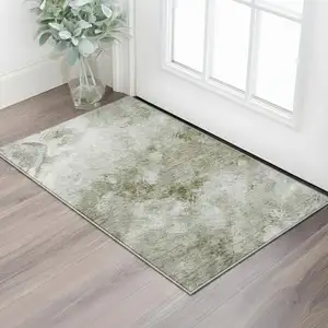 Photo of Taupe Ivory And Gray Abstract Washable Area Rug With UV Protection