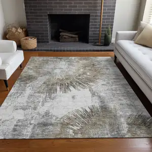 Photo of Taupe Ivory And Gray Abstract Washable Area Rug With UV Protection