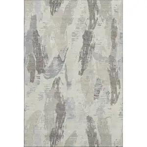 Photo of Taupe Ivory And Gray Abstract Washable Area Rug With UV Protection