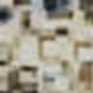 Photo of Taupe Ivory And Gray Abstract Washable Area Rug With UV Protection