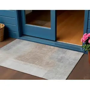Photo of Taupe Ivory And Gray Abstract Washable Indoor Outdoor Area Rug