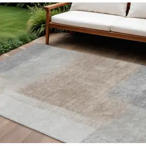 Photo of Taupe Ivory And Gray Abstract Washable Indoor Outdoor Area Rug