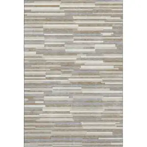 Photo of Taupe Ivory And Gray Striped Washable Area Rug With UV Protection