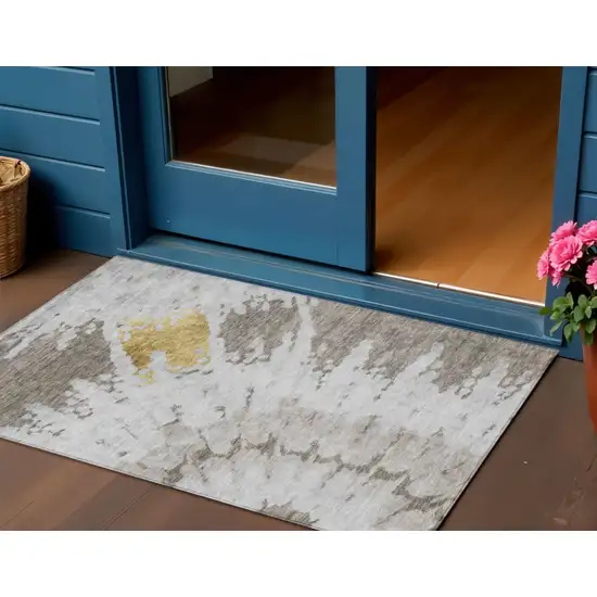 Taupe Khaki And Ivory Abstract Washable Indoor Outdoor Area Rug Photo 1