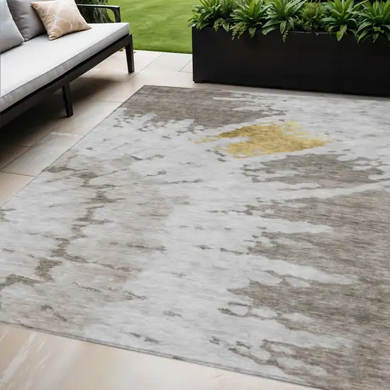 Taupe Khaki And Ivory Abstract Washable Indoor Outdoor Area Rug Photo 1