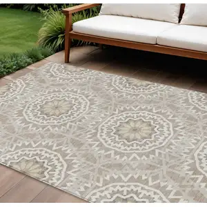 Photo of Taupe Khaki And Ivory Floral Medallion Washable Indoor Outdoor Area Rug