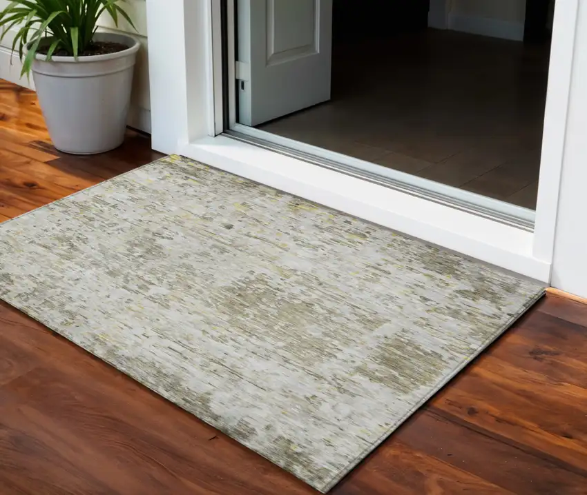 Taupe Light Yellow And Ivory Abstract Washable Indoor Outdoor Area Rug Photo 1