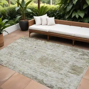 Photo of Taupe Light Yellow And Ivory Abstract Washable Indoor Outdoor Area Rug