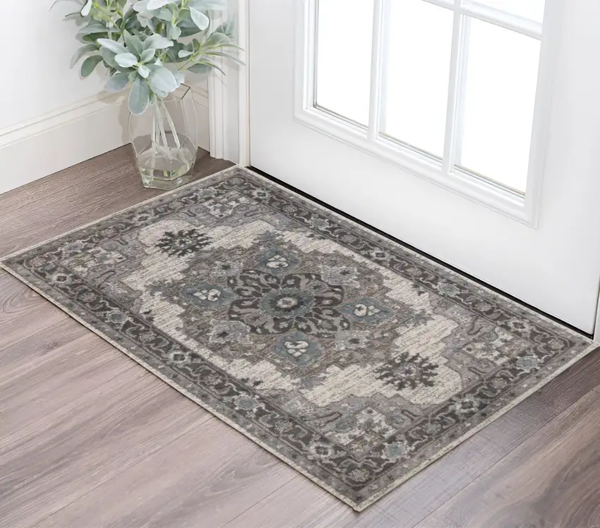 Ivory Taupe and Gray Medallion Power Loom Area Rug Photo 1