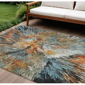 Photo of Taupe Orange And Ivory Abstract Washable Indoor Outdoor Area Rug